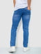 Синие джинсы с потертостями | 6812528 | фото 4