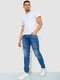 Синие джинсы с потертостями и карманами | 6812531 | фото 2