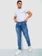 Синие джинсы с потертостями и карманами | 6812532 | фото 2