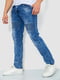 Синие джинсы с потертостями и карманами | 6812535 | фото 3
