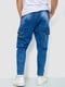 Синие джинсы с потертостями и накладными карманами | 6812536 | фото 4