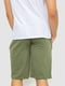 Шорты цвета хаки с боковыми карманами | 6812628 | фото 4