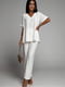 Білий костюм-двійка: блуза і штани | 6816451 | фото 2