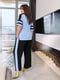 Костюм-двійка: блакитна блуза з принтом і чорні штани | 6816459 | фото 4