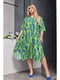 Сукня А-силуету салатового кольору з контрастним принтом та кишенями | 6816570 | фото 2