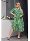 Сукня А-силуету салатового кольору з контрастним принтом та кишенями | 6816570 | фото 3