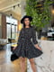 Чорна сукня А-силуету з квітковим принтом та розкльошеною спідницею | 6816578 | фото 2