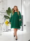 Зелена сукня А-силуету з квітковим принтом та розкльошеною спідницею | 6816596 | фото 9