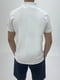 Біла футболка-поло з вишитим логотипом бренду | 6817325 | фото 4
