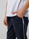 Темно-сині спортивні штани з написами | 6819368 | фото 2