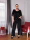 Велюровий чорний костюм: блуза з мереживами та вільні штани | 6821135 | фото 3
