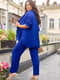 Монохромний синій костюм жатка: сорочка з розрізами та штани | 6821307 | фото 4