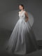 Біла весільна сукня з глибоким декольте і мереживом | 6506057 | фото 2