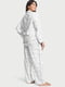 Біла фланелева піжама в принт: сорочка і штани | 6825866 | фото 2