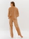 Велюрова піжама карамельного кольору: пуловер та штани | 6699145 | фото 3