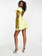 Жовта сукня А-силуету з розкльошеною спідницею | 6724843 | фото 2