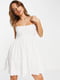 Біла сукня А-силуету з спідницею в складку | 6724872