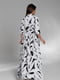 Біло-чорна довга сукня з розрізом | 6828978 | фото 3