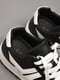 Кросівки чорно-білого кольору на шнурівці | 6828287 | фото 4