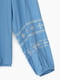 Блакитна сорочка з білою орнаментованою вишивкою | 6749853 | фото 9