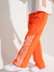 Костюм: футболка з принтом та широкі оранжеві штани | 6803192 | фото 13