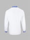 Біла сорочка, прикрашена орнаментною вишивкою блакитного кольору | 6829388 | фото 2