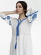 Біла вишита сукня, прикрашена орнаментом | 6829517 | фото 3
