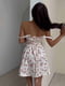 Біла А-силуетна міні-сукня в квітковий принт | 6833614 | фото 4