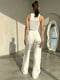 Розкльошені білі штани з акцентними швами | 6834787 | фото 3