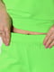 Трикотажний салатовий костюм: футболка-поло та штани | 6835183 | фото 4