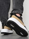 Кросівки чорного кольору з бежевими вставками на шнурівці | 6835391 | фото 3