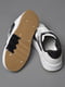 Кросівки біло-чорного кольору на шнурівці  | 6835731 | фото 4