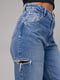 Синие джинсы с декоративными разрезами на бедрах | 6838534 | фото 4