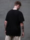 Чорна футболка  Оверсайз з принтом | 6839410 | фото 3