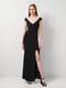 Длинное черное платье с глубоким разрезом на ноге | 6840559