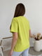 Салатова трикотажна футболка з написами | 6845295 | фото 3