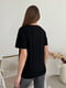 Чорна вільна трикотажна футболка з принтом  | 6845326 | фото 3