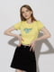Жіноча коротка футболка L жовтий Divоn ЦБ-00219009 | 6841728