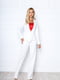 Брючний костюм асиметрія білого кольору на підкладці: жакет і штани | 6846949 | фото 3