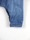 Джинсовий синій комбінезон з оборками і вишивкою | 6848895 | фото 3