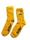 Жовті шкарпетки з малюнком та написом | 6849567