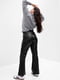 Черные расклешенные брюки из экокожи | 6850952 | фото 5