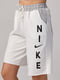 Трикотажні шорти молочного кольору з написом Nike | 6851489 | фото 4