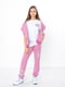 Рожеві трикотажні спортивні штани з принтом | 6852312