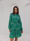 Короткое расклешенное зеленое платье в цветочный принт | 6853158 | фото 3