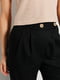 Льняні чорні штани з асиметричною застібкою | 6853415 | фото 3