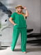 Зелений трикотажний костюм-двійка: блуза вільного крою, штани | 6858494 | фото 6