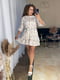 Біла штапельна сукня міні в квітковий принт з рюшею | 6858591 | фото 5