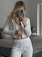 Трикотажная пижама молочного цвета: укороченная кофта и брюки | 6865484 | фото 2