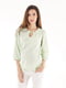 Перфорована блузка салатового кольору вільного силуету для вагітних | 6865650